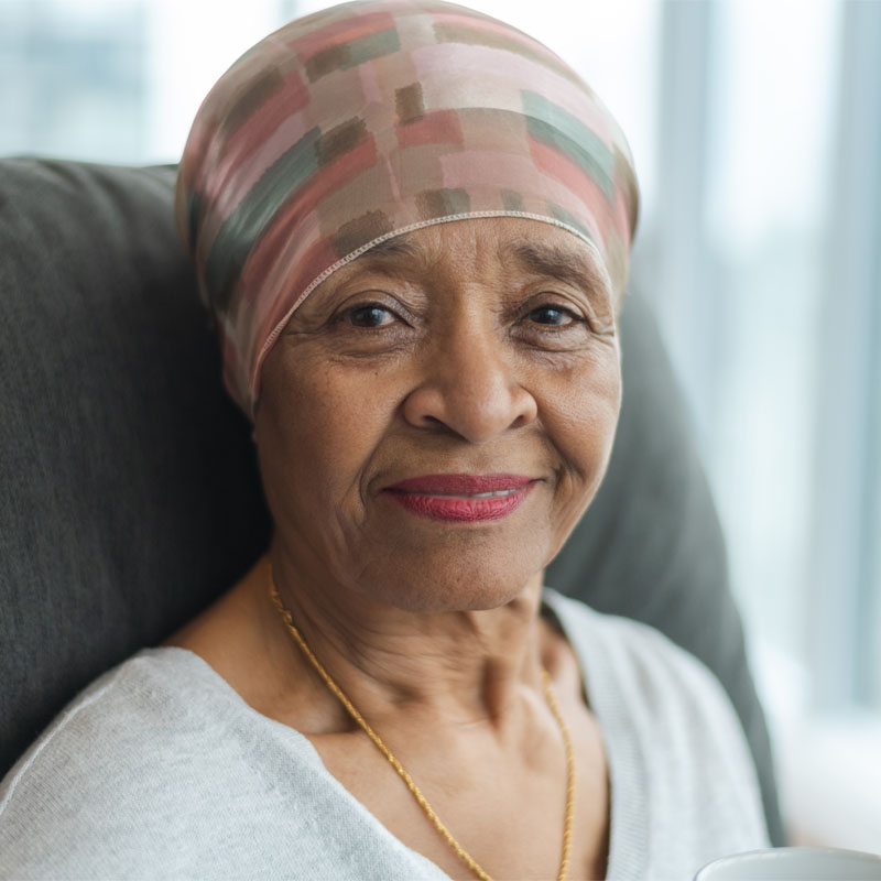 Portrait of a contemplative senior woman with cancer
